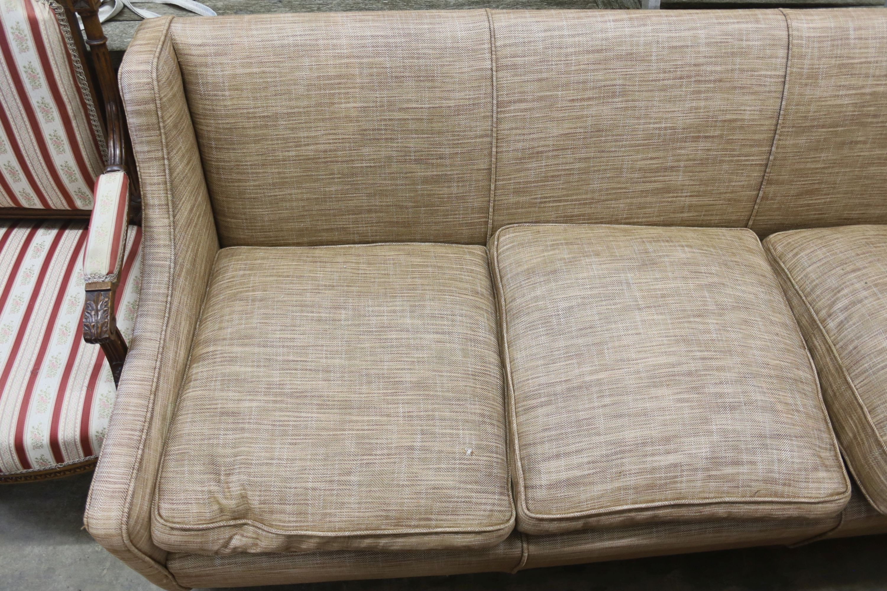 A contemporary upholstered three seater settee, width 190cm, depth 84cm, height 80cm